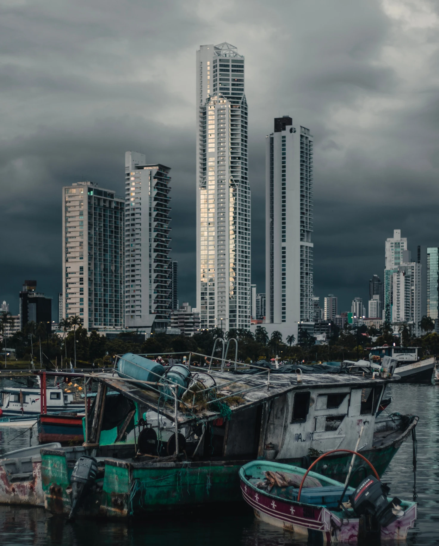 Panama City skyline framed by old fishermen's boats. 