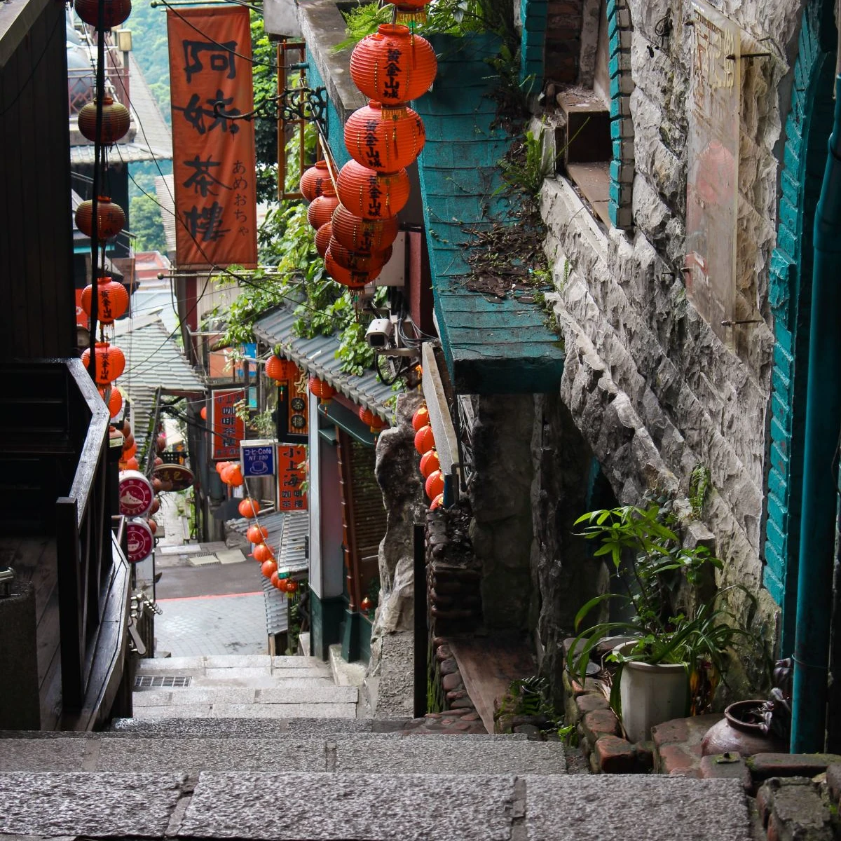 alley way with hanging red lanterns