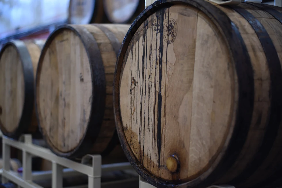 Wooden whiskey barrels. 