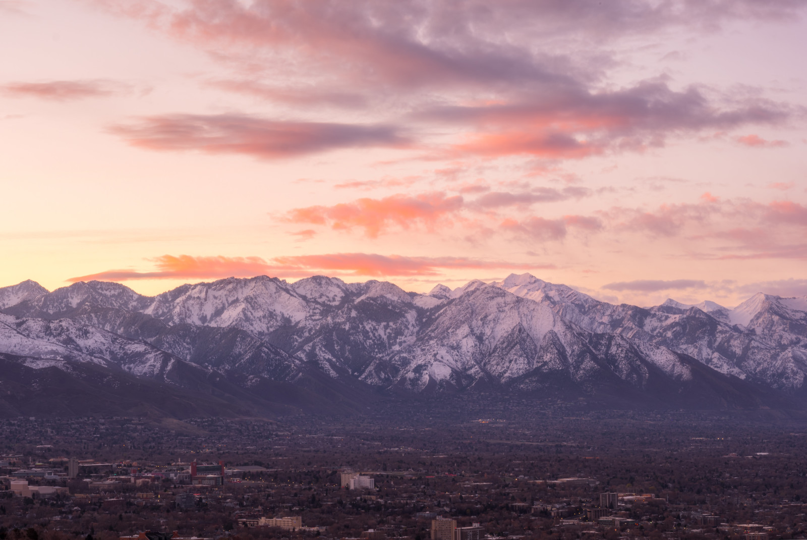 snow-capped mountains during sunset