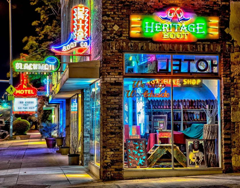 boot store with neon signs