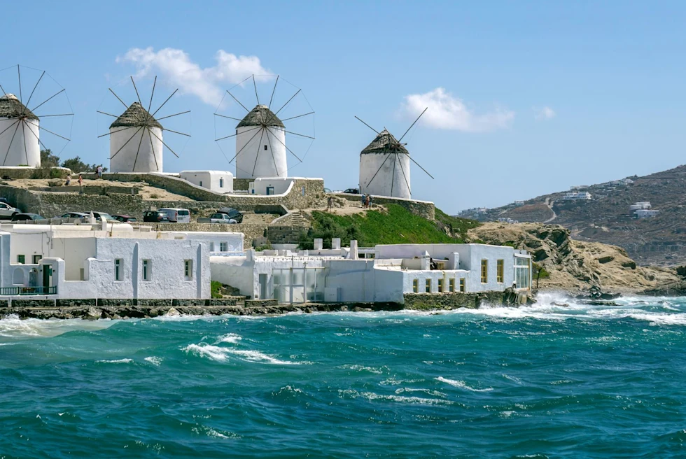 a rows of windmills on an island