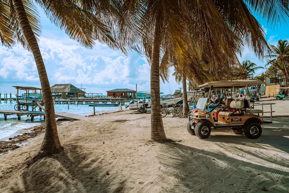 A beach view with a transportation vehicle