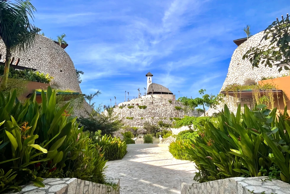 Xcaret Arte hotel with tropical plants. 