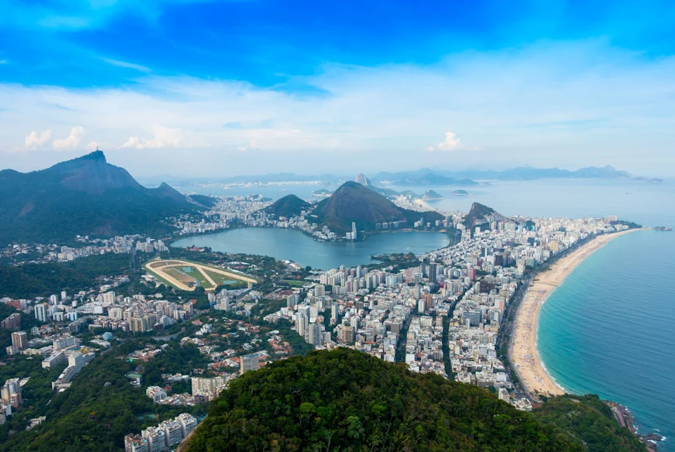 An aerial photo of a beach and city.