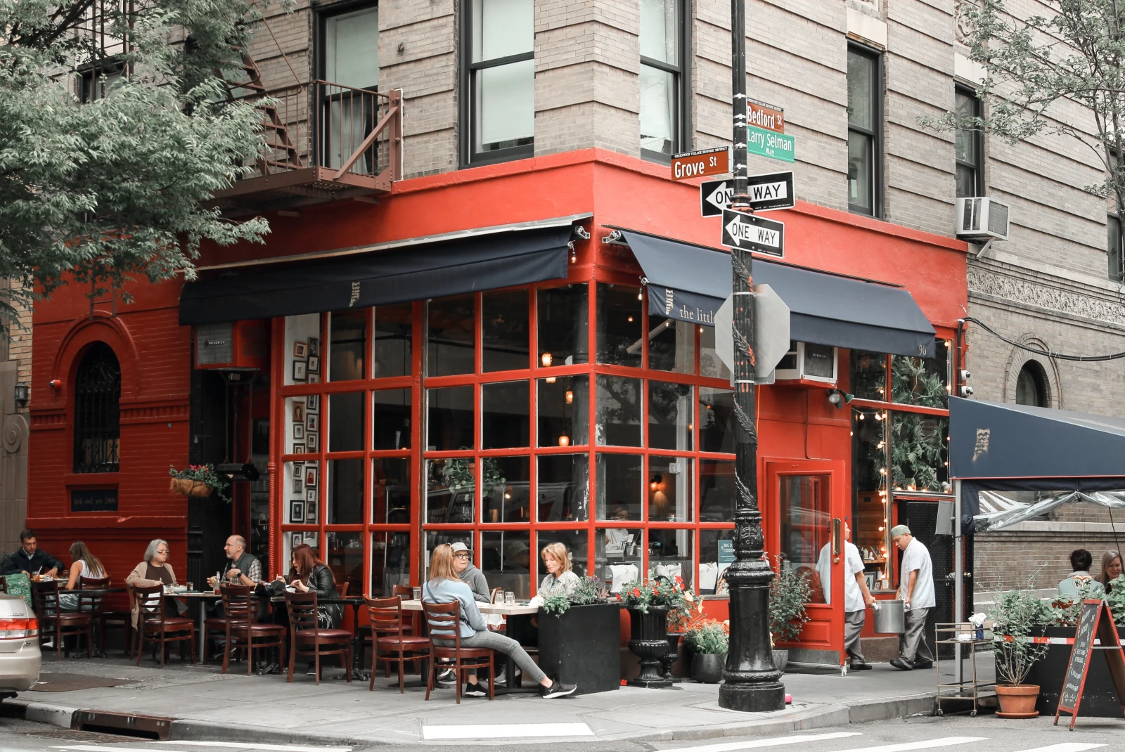 An orange colored street Cafe.