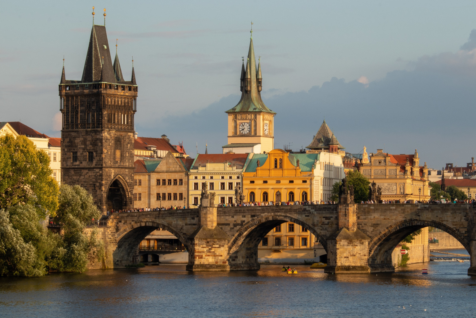 Bridge with buildings in the background in Prague