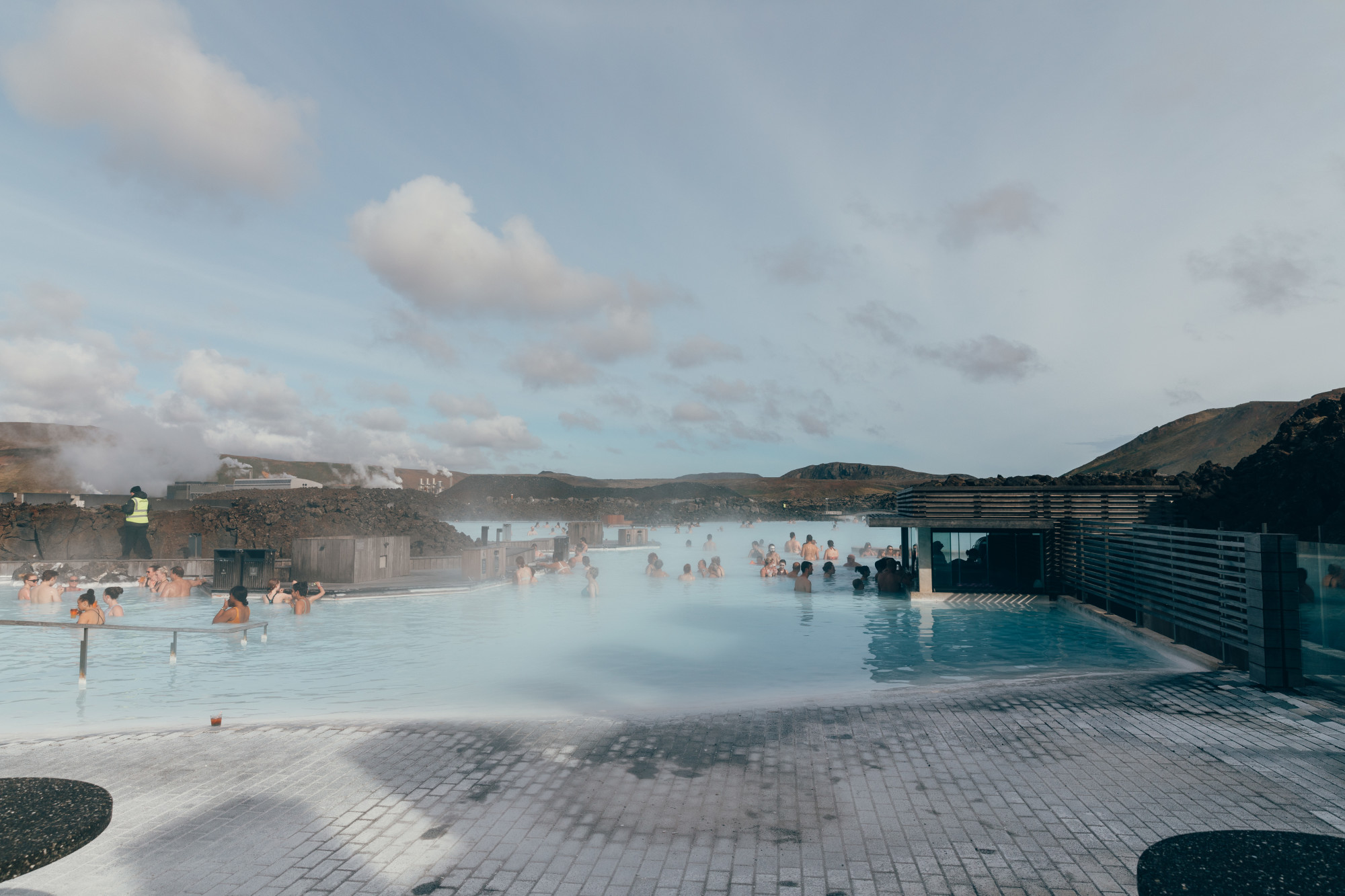 People swimming in a swimming pool. 