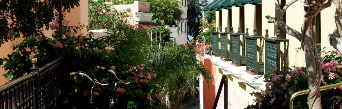 Quiet and charming street on on hill and stairway with a unique view of San Juan in Puerto Rico. 