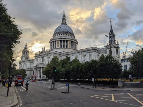 A photo of a cathedral during a cloudy day at sunset