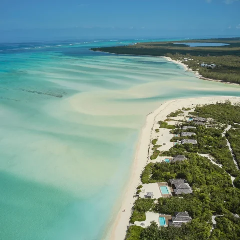 aerial view of white sand and coastline during daytime