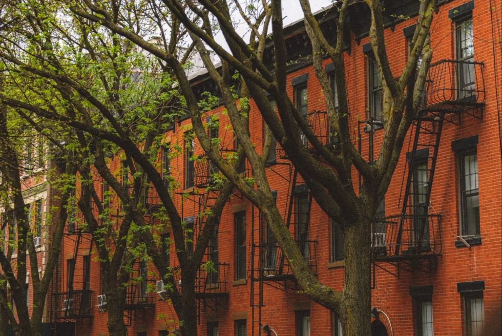 red brick buildings on a quiet city street in spring