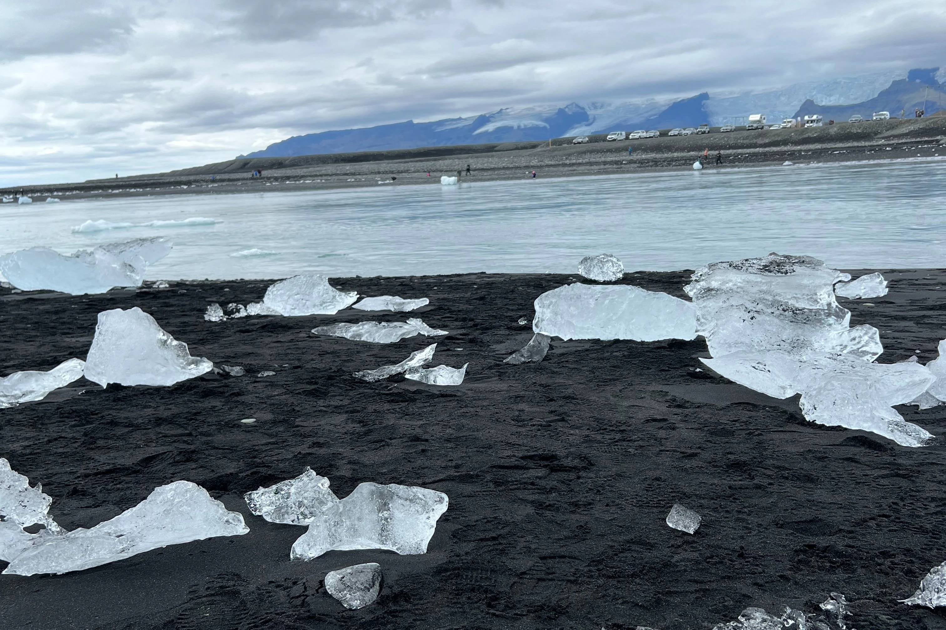 The Diamond Beach is a black volcanic sand beach where icebergs from the glacier lagoon drift ashore.