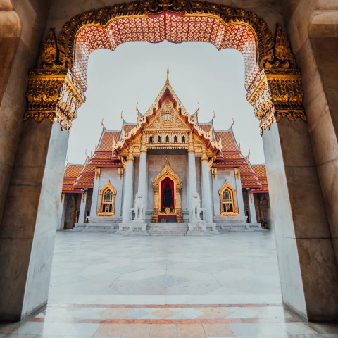 archway with temple in background during daytime