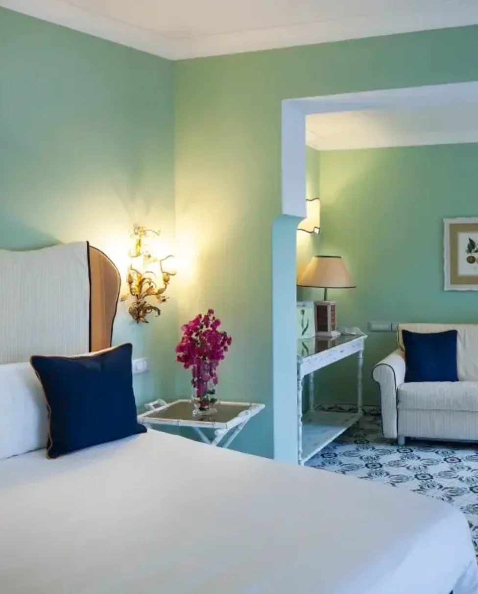 blue-walled hotel room