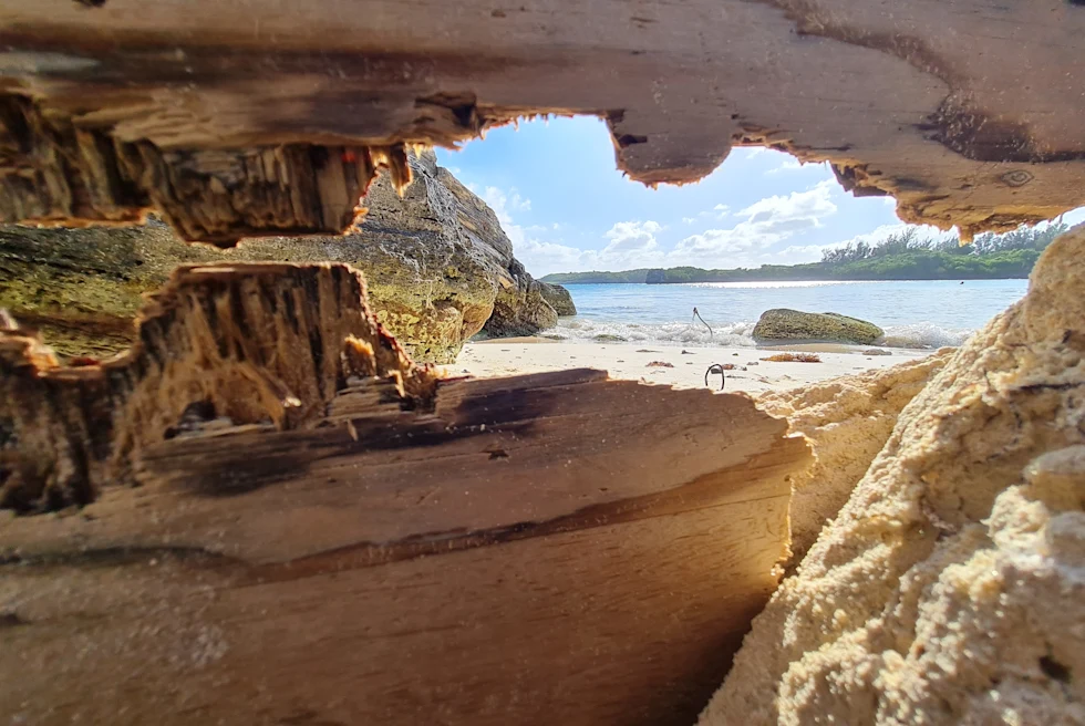 View of the ocean and blue sky from a cave in Bermuda