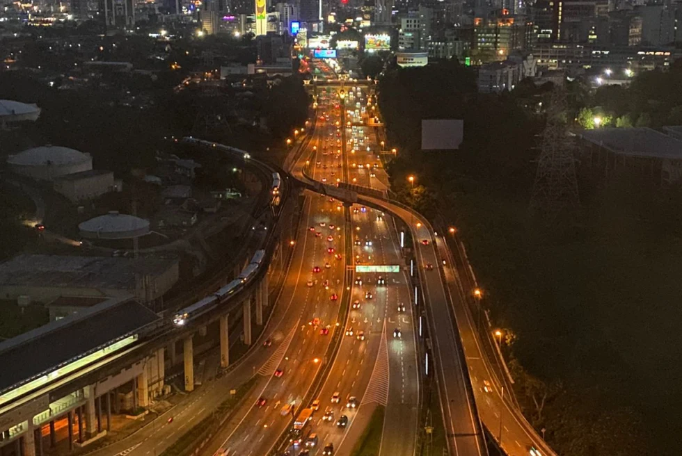 An aerial night view of Kuala Lumpur.