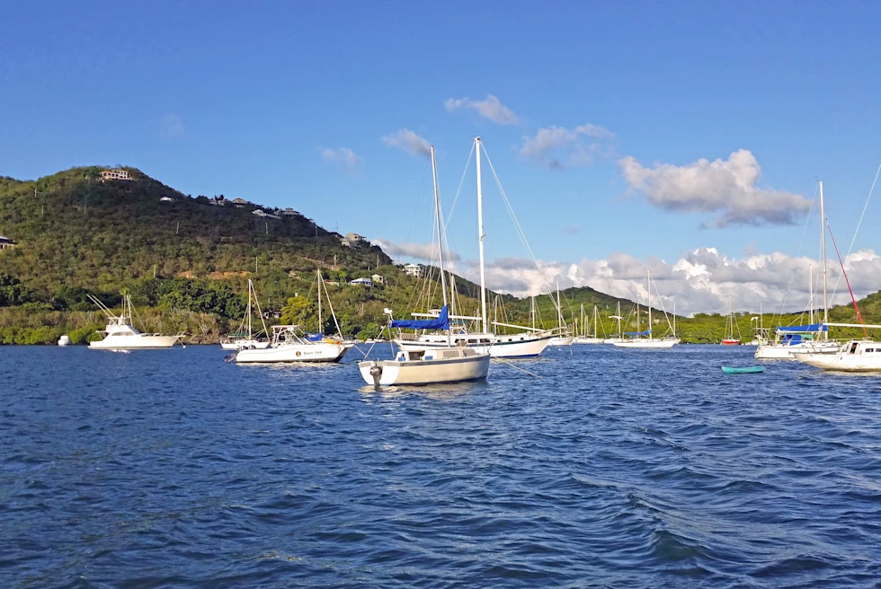 Sail boats on Coral Bay in St. John with a blue sky