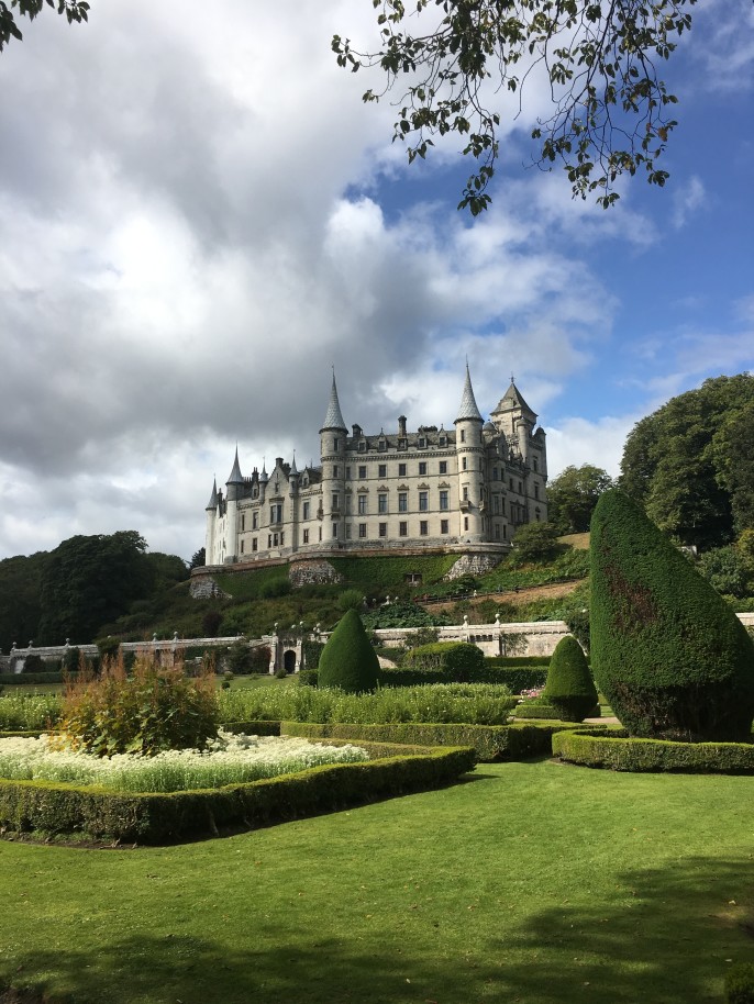 A view of Dunrobin Castle in Scotland from the garden