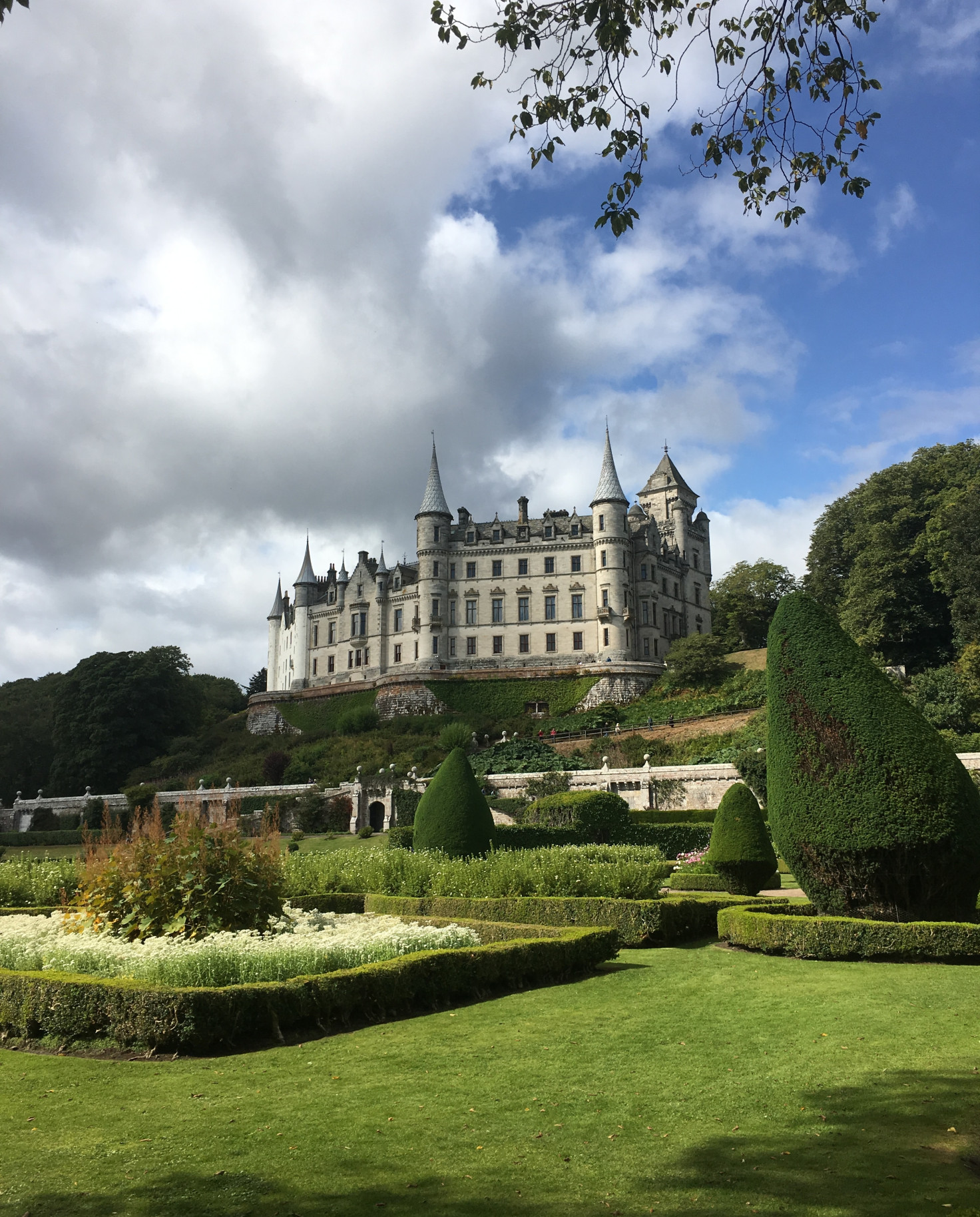 A view of Dunrobin Castle in Scotland from the garden