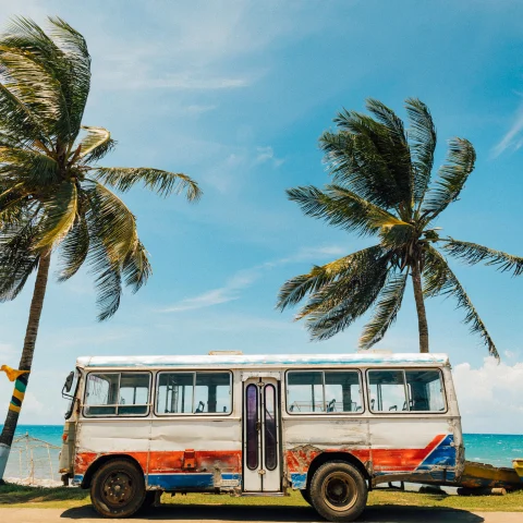 Colorful bus on the beach in Jamaica