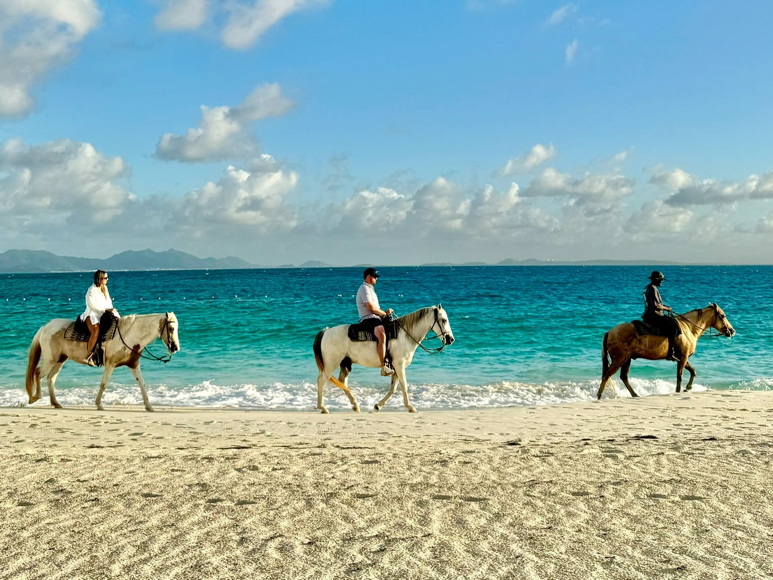 Horse riding on the beach