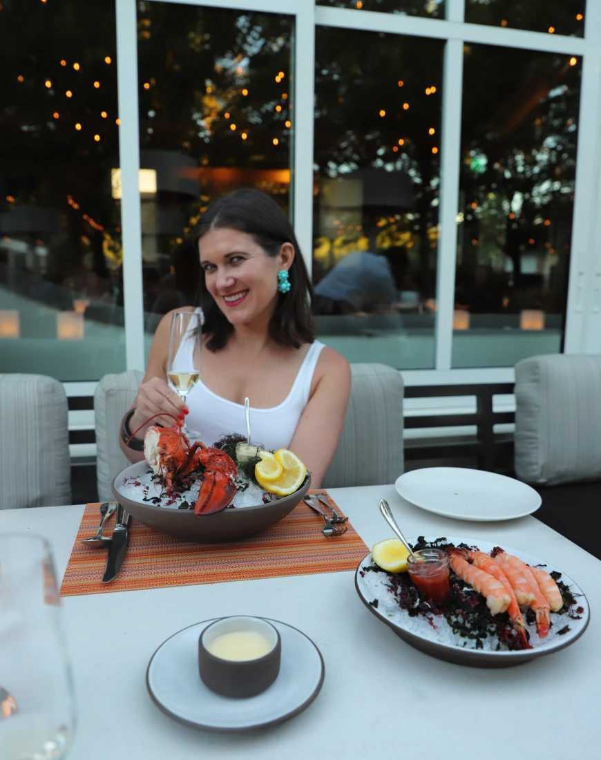 Travel advisor posing with food 