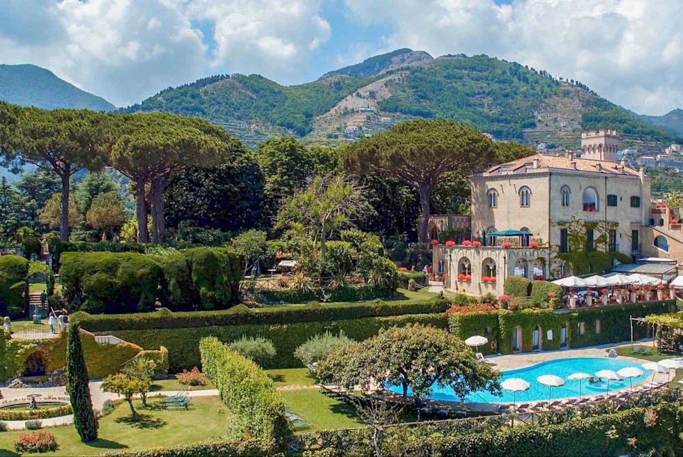 Villa Cimbrone Gardens is a breathtaking Italian oasis perched atop the Amalfi Coast, adorned with exquisite sculptures and offering panoramic vistas of the Mediterranean.