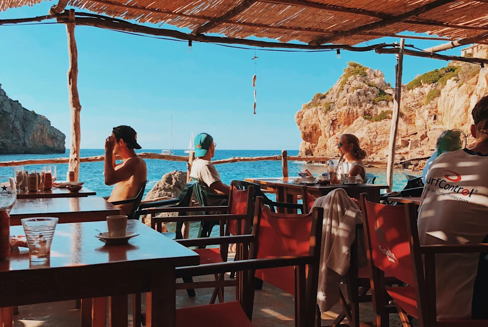 Chairs and tables overlooking the water in Mallorca, Spain