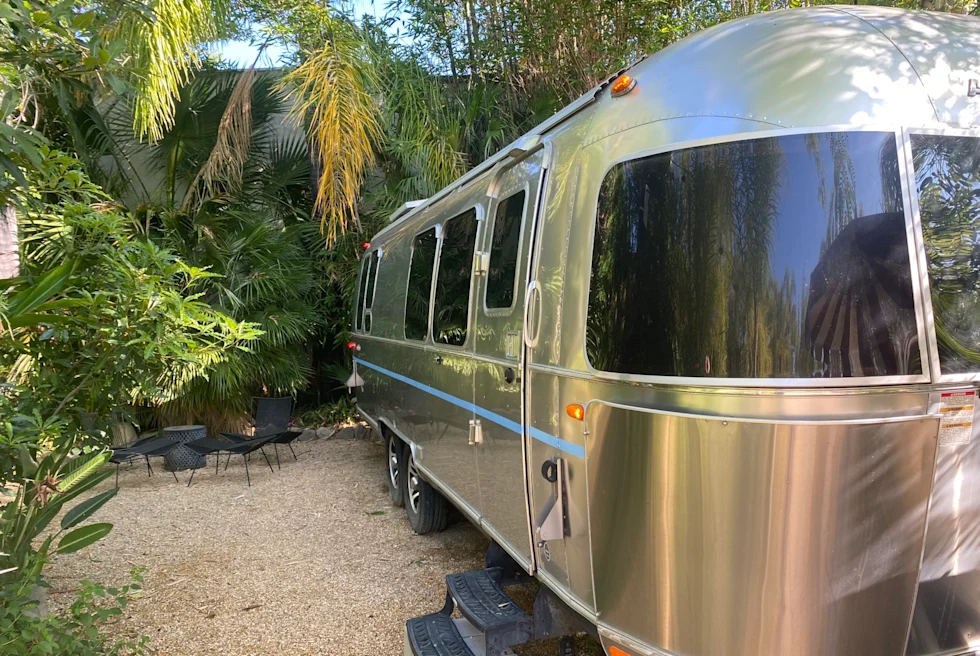 A silver van parked outdoors.