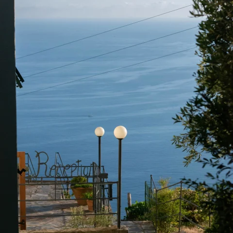 view into the vast ocean from a hilltop hotel reception balcony on a sunnday