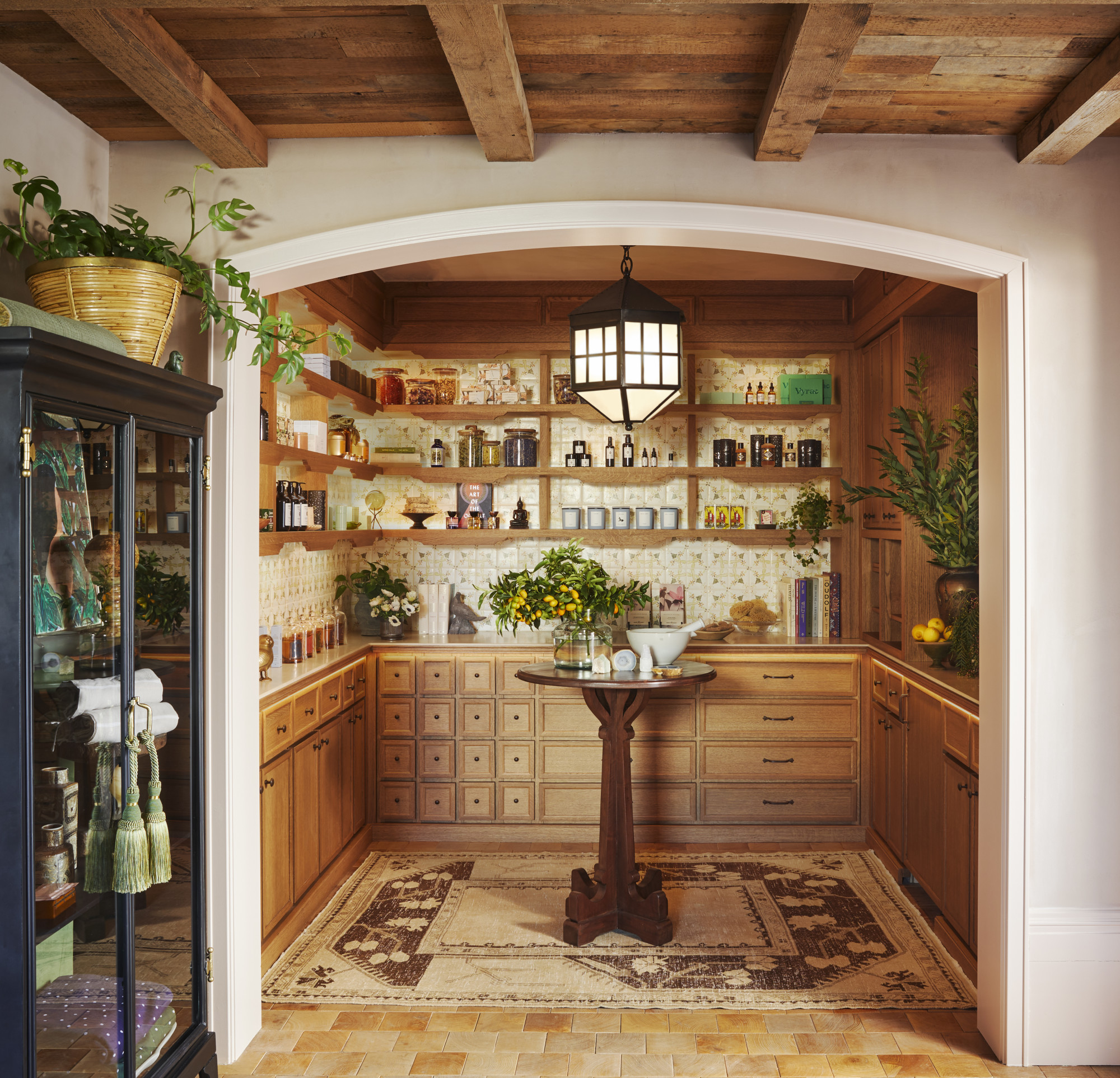A chic modern apothecary with shelves displaying lotions and potions