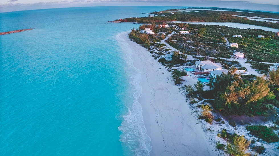 Aerial view of white sand and blue waters at Tropic of Cancer beach in the Bahamas