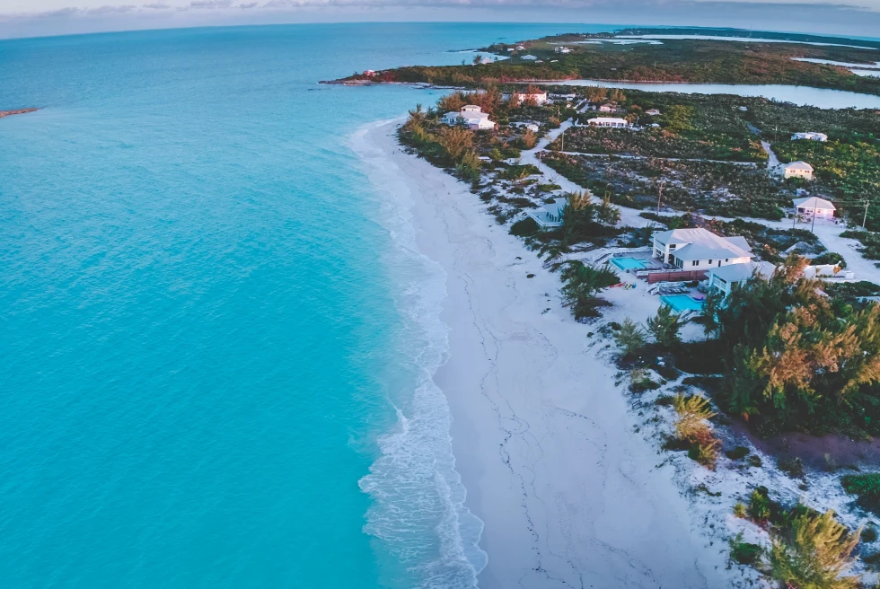 Aerial view of white sand and blue waters at Tropic of Cancer beach in the Bahamas