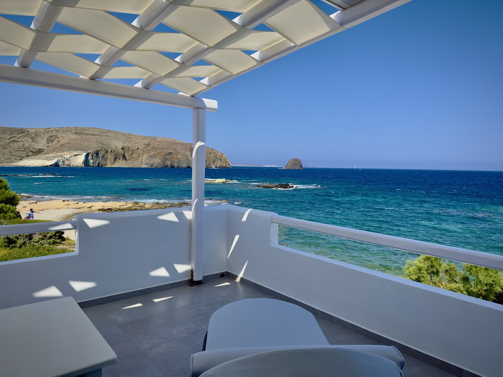 Outdoor sitting near ocean.