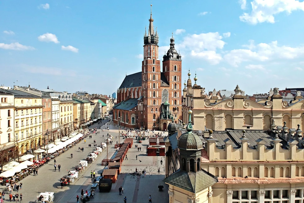 main market square in a old city with vendor tens lining the street