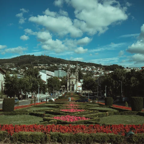 large garden with a building in the background