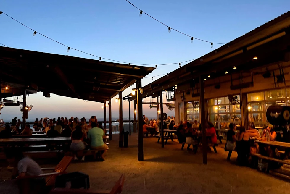 outdoor bar on a clear blue sky night