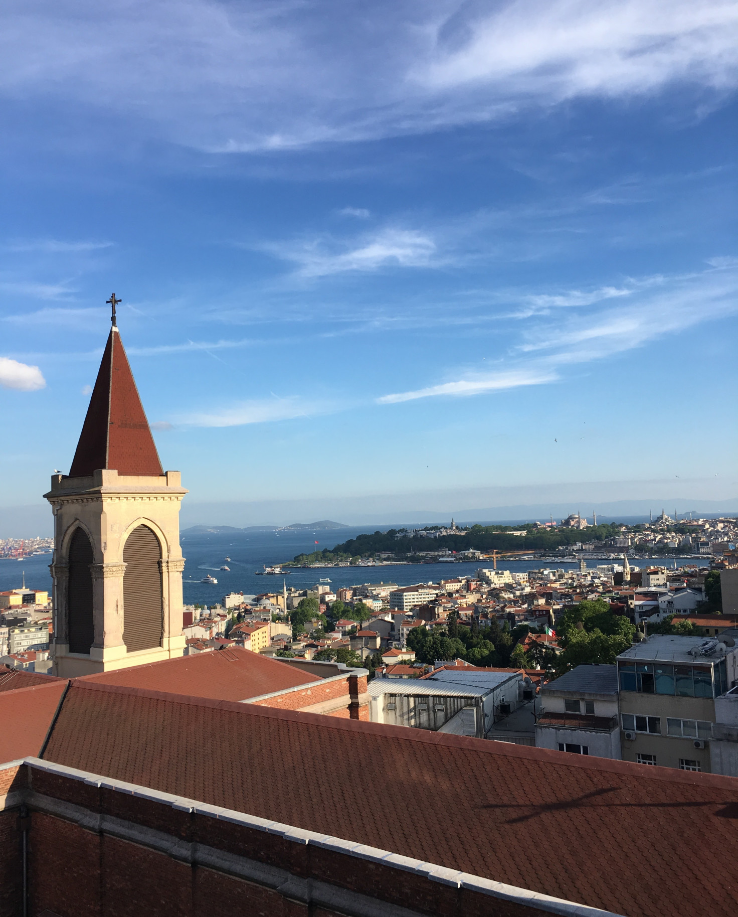 building overlooking city and the ocean during daytime