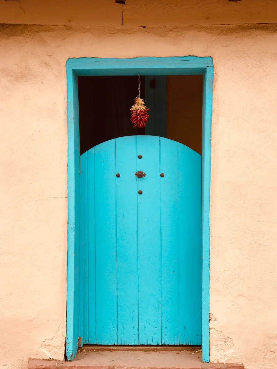 Blue door on adobe building in Santa Fe, New Mexico