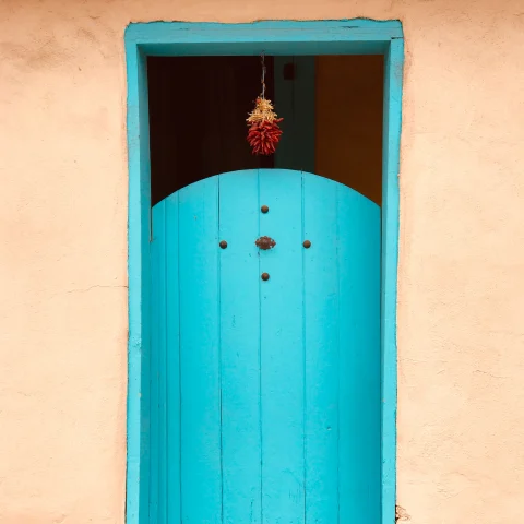 Blue door on adobe building in Santa Fe, New Mexico