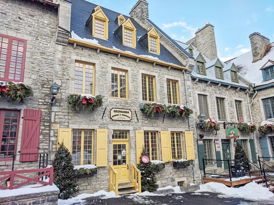 brown stone and yellow window doors in Quebec City Canada