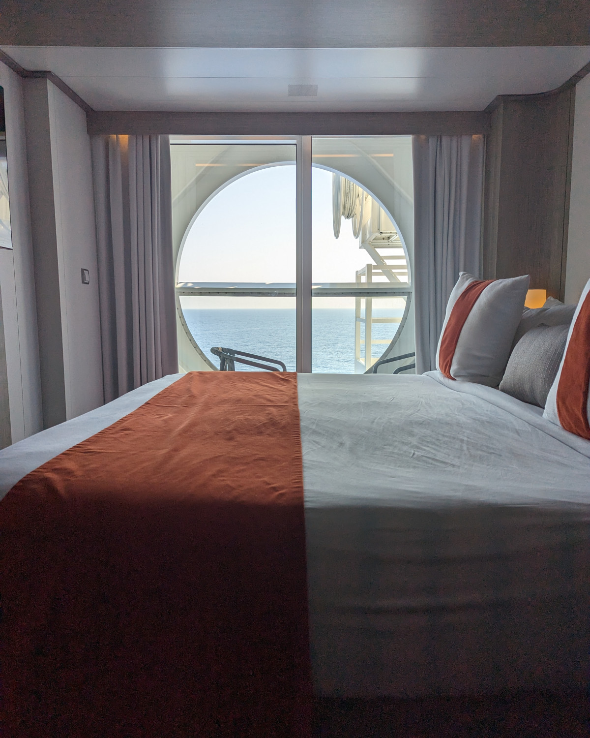 Hotel room and glass window with sea view