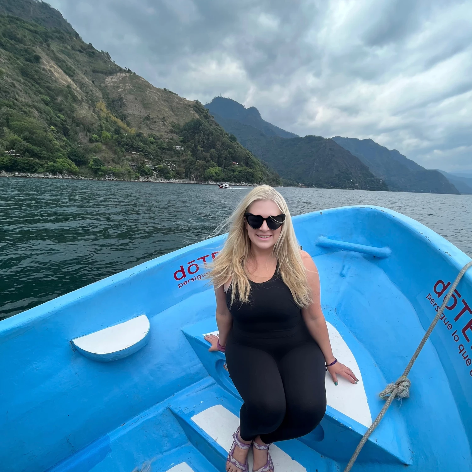 Travel advisor posing on a boat