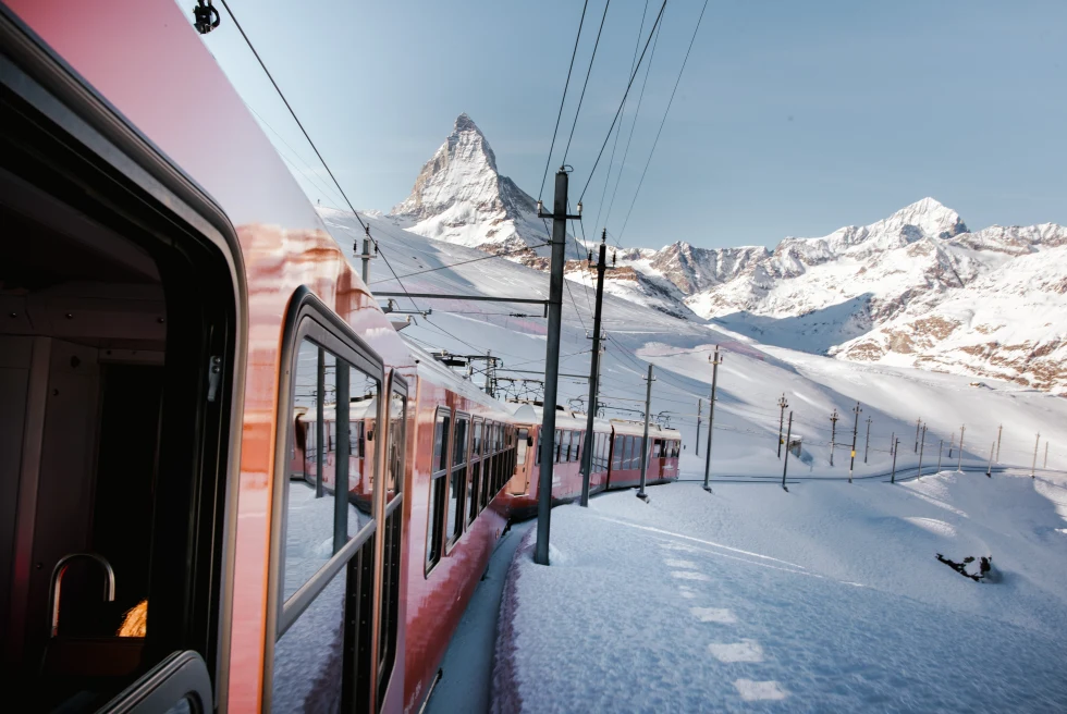train traveling on white mountain