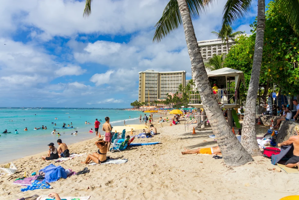 People on the beach in Hawaii. 