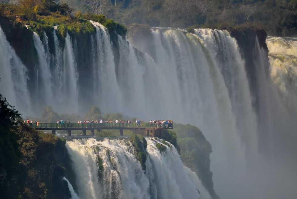 Iguazu Falls with tourists.