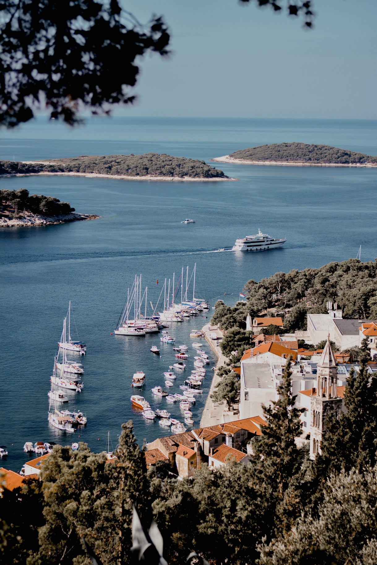 view of boats along the coastline during daytime