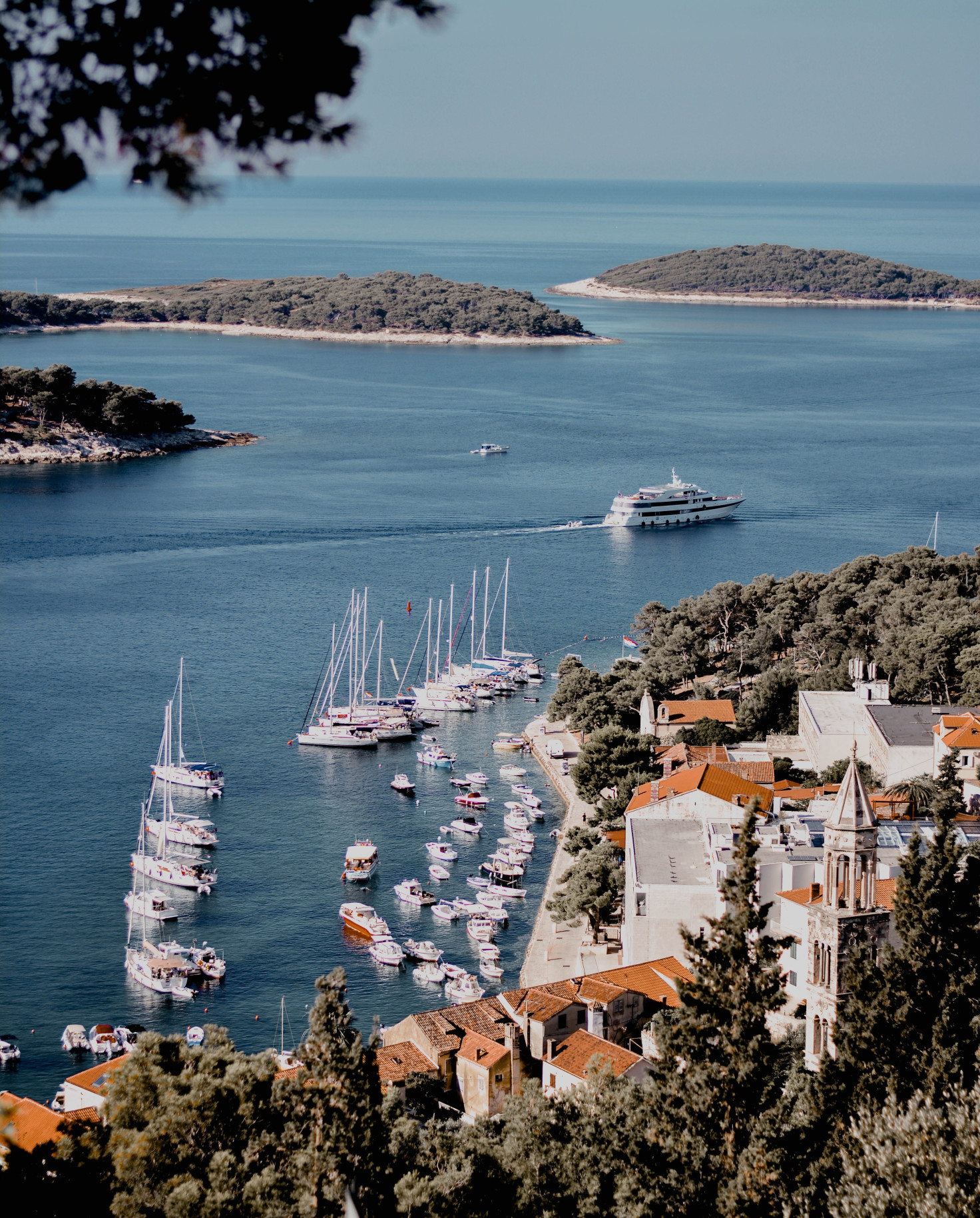 view of boats along the coastline during daytime