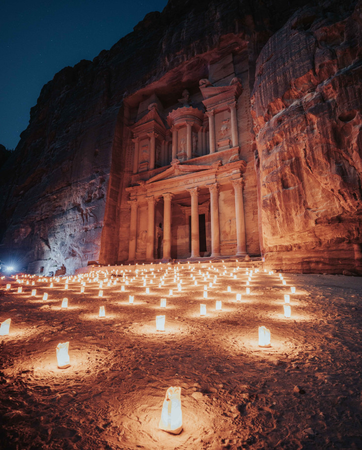 Candles light up the night sky in Petra, Jordan